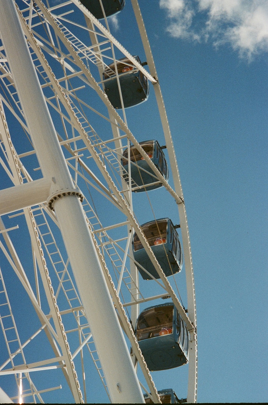 Film-like black and white photo of a ferris wheel